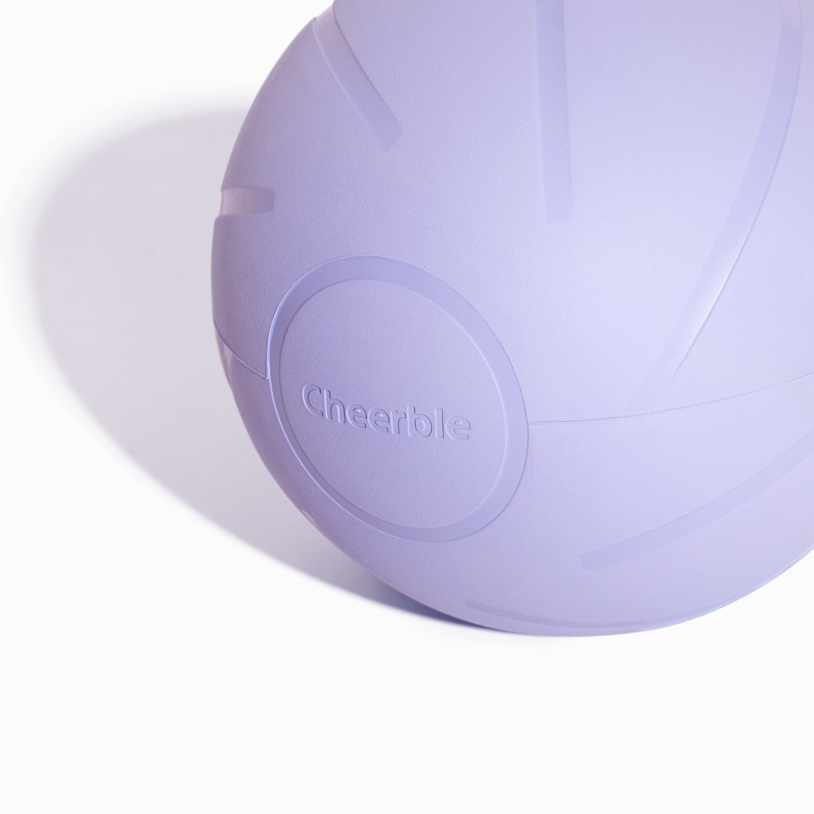 Close up of the purple Cheerble Wicked Ball PE dog toy